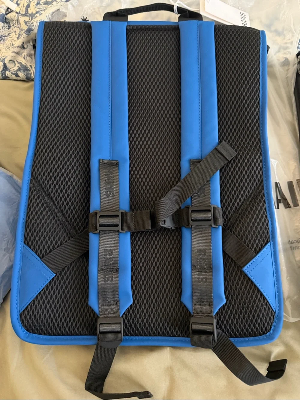 NWt•Rains Blue and Black Roll-Top Backpack•MSRP $155
